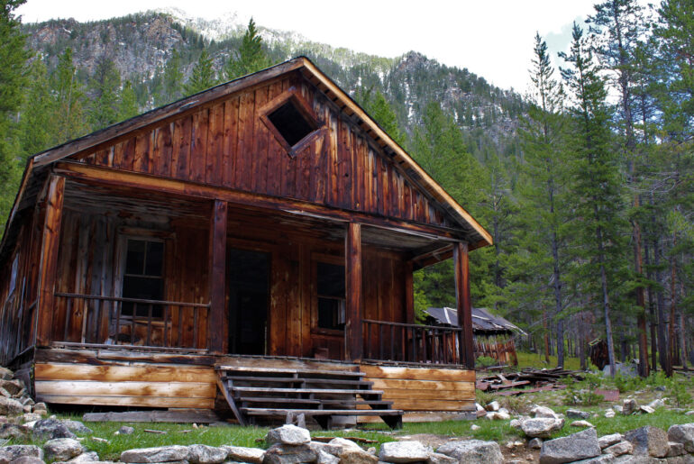 Montana's Historic Ghost Town Is An Abandoned Beauty Hidden In The State's Mountainous Woodlands