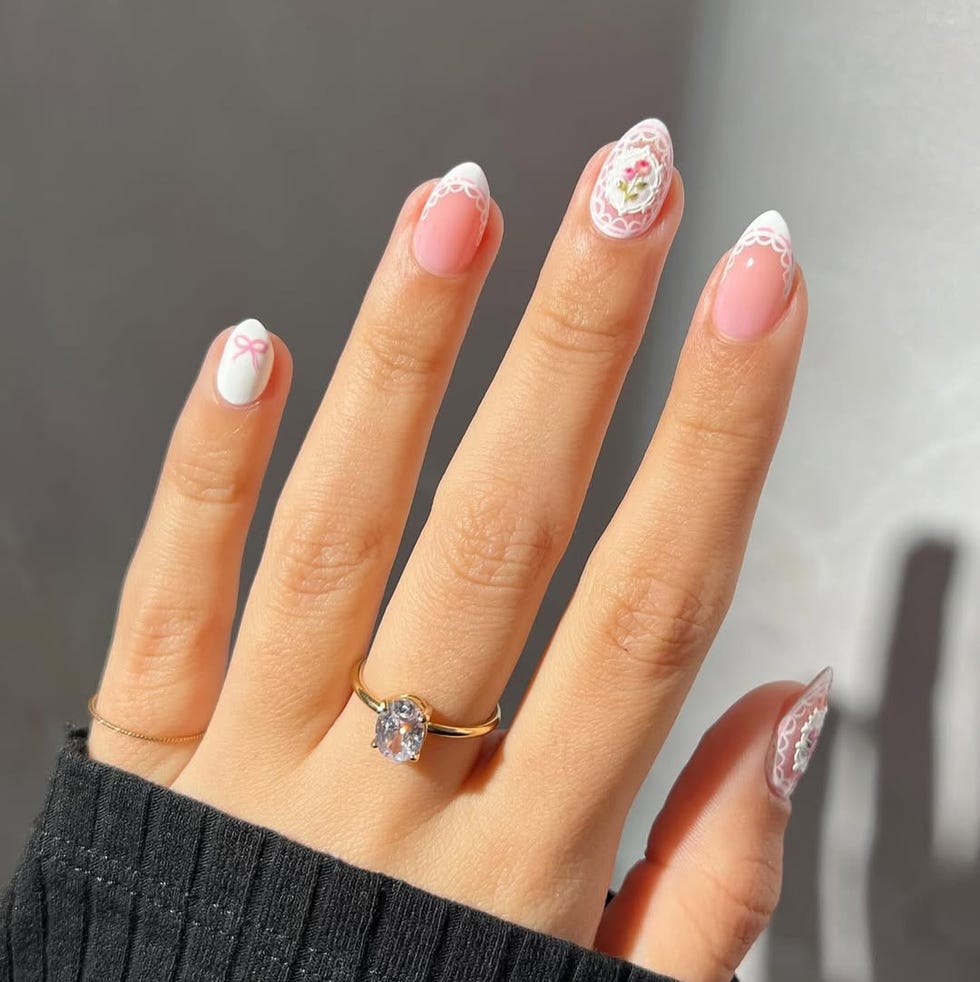 decoratively manicured nails with a ring decoratively manicured nails with a ring