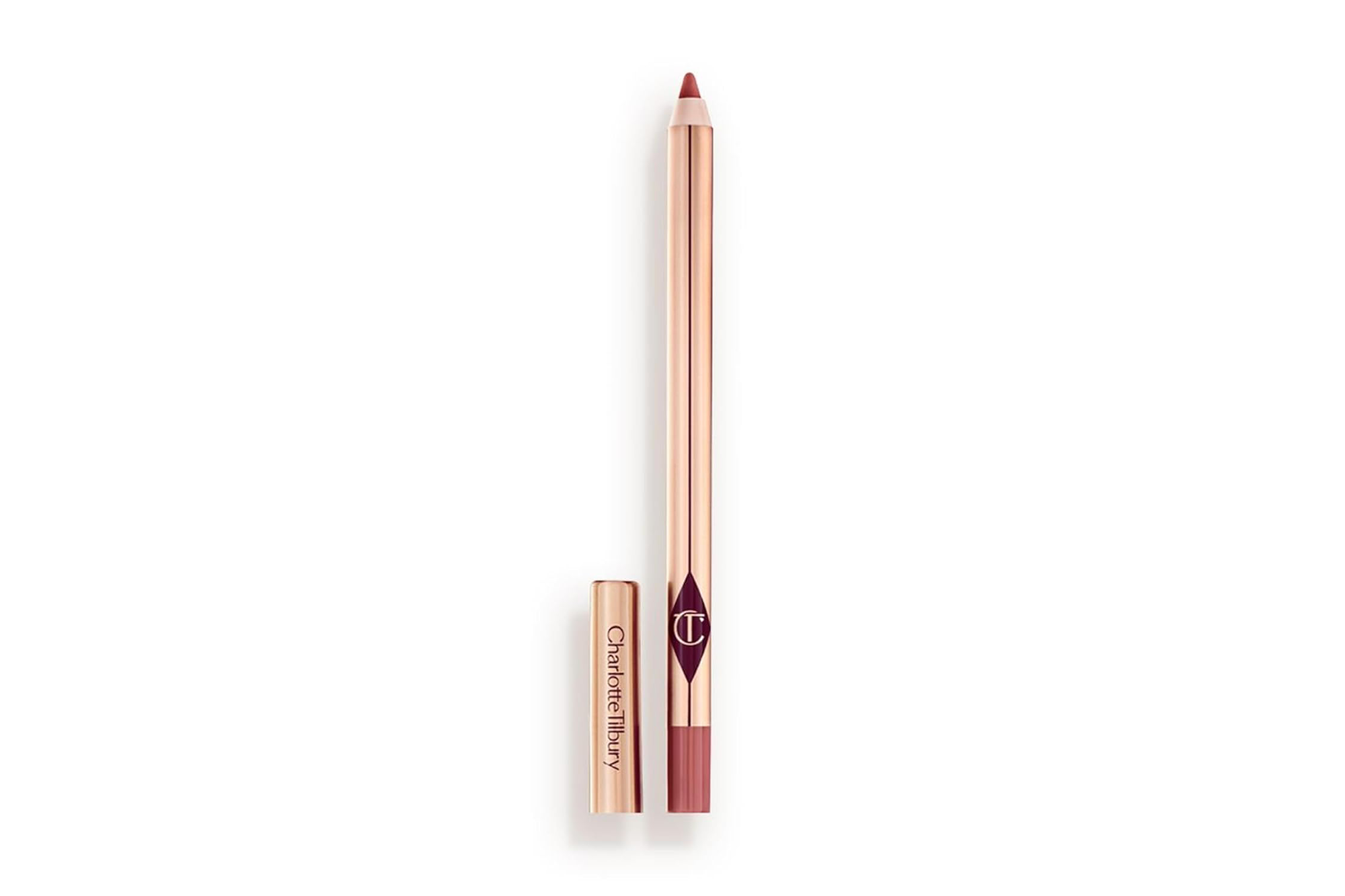 A rose gold Charlotte Tilbury lip liner with the cap off.