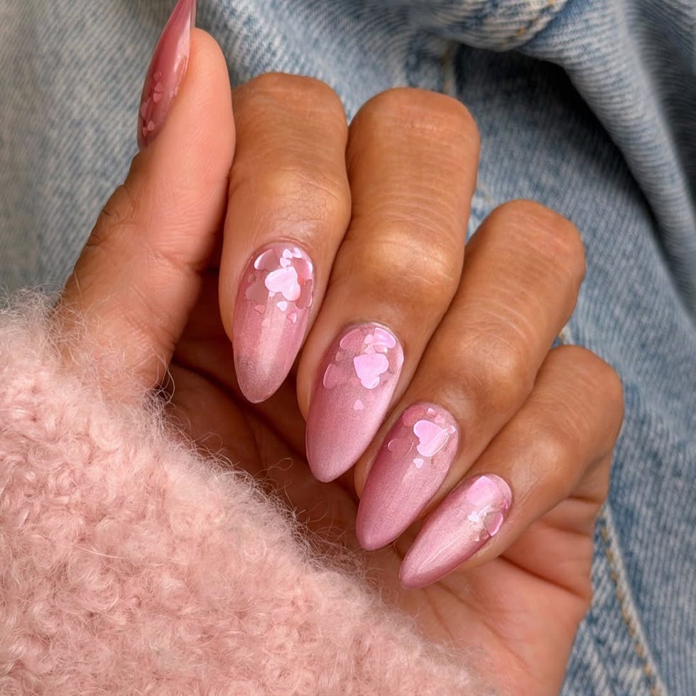 nail art design featuring pink gradient and heart motifs nail art design featuring pink gradient and heart motifs