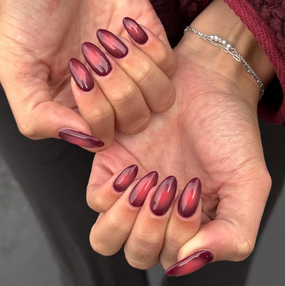 colorful manicured nails displayed on hands colorful manicured nails displayed on hands
