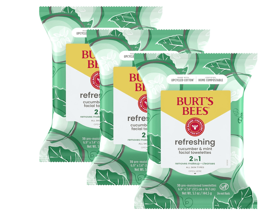 Three packs of Burt's Bees cucumber mint facial towelettes with green leaf design.