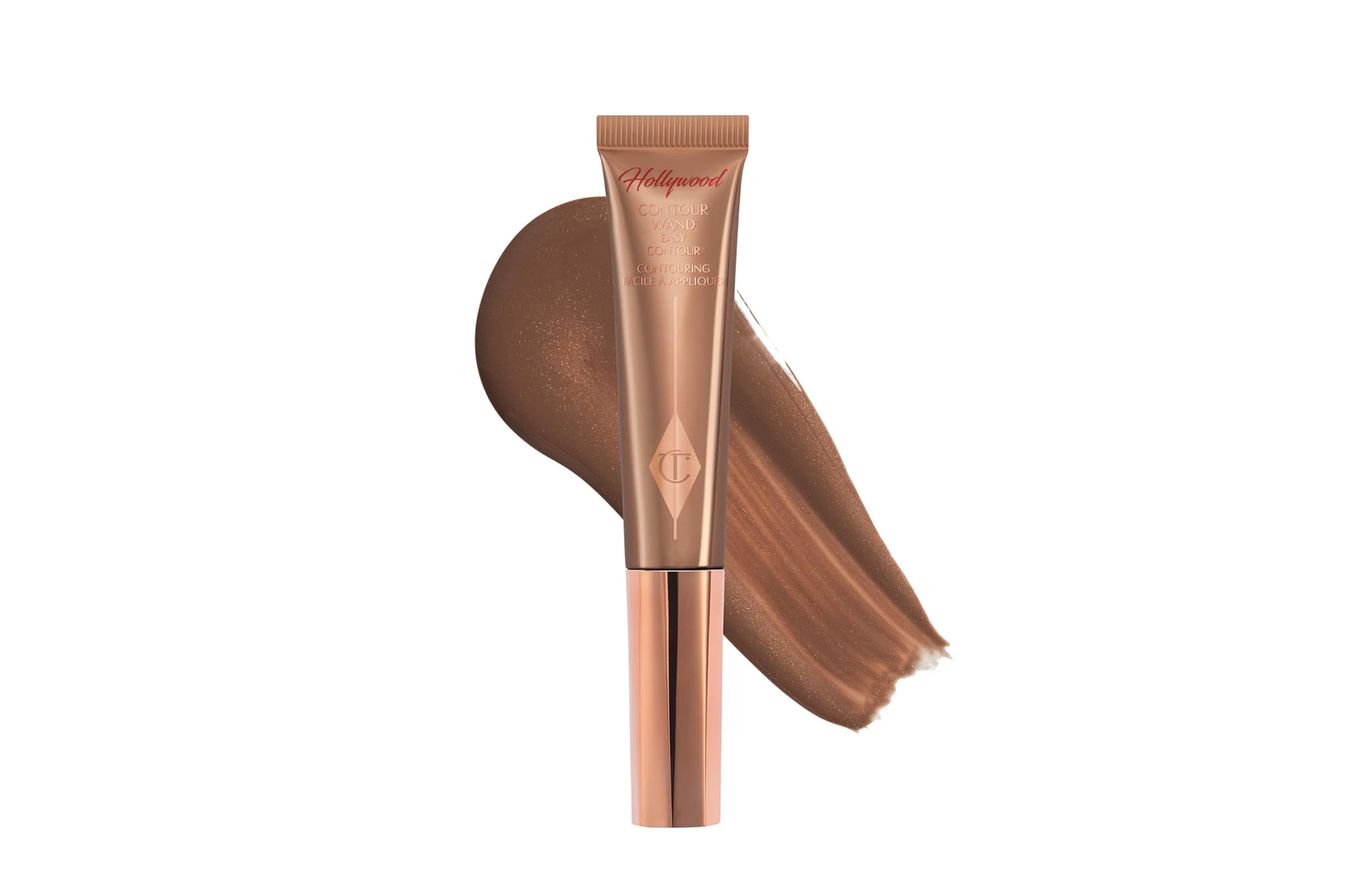 Charlotte Tilbury Hollywood Contour Wand with a swipe of brown contour cream.