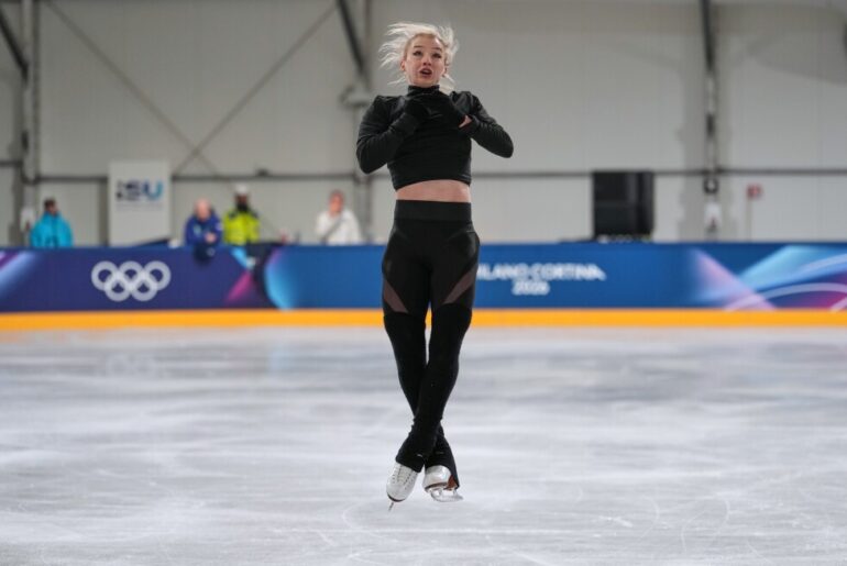 Worried Olympians use masks, sanitizer to fend off COVID