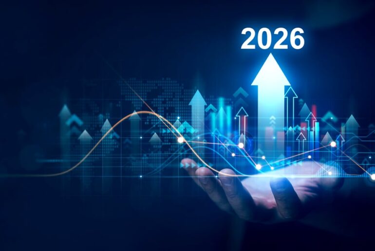 Upward facing arrows and the numbers 2026 hover above an outstretched hand.