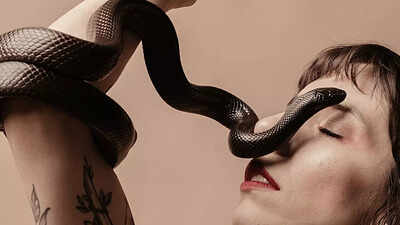 Yoga with pythons! Portland’s new wellness craze involves stretching with live snakes