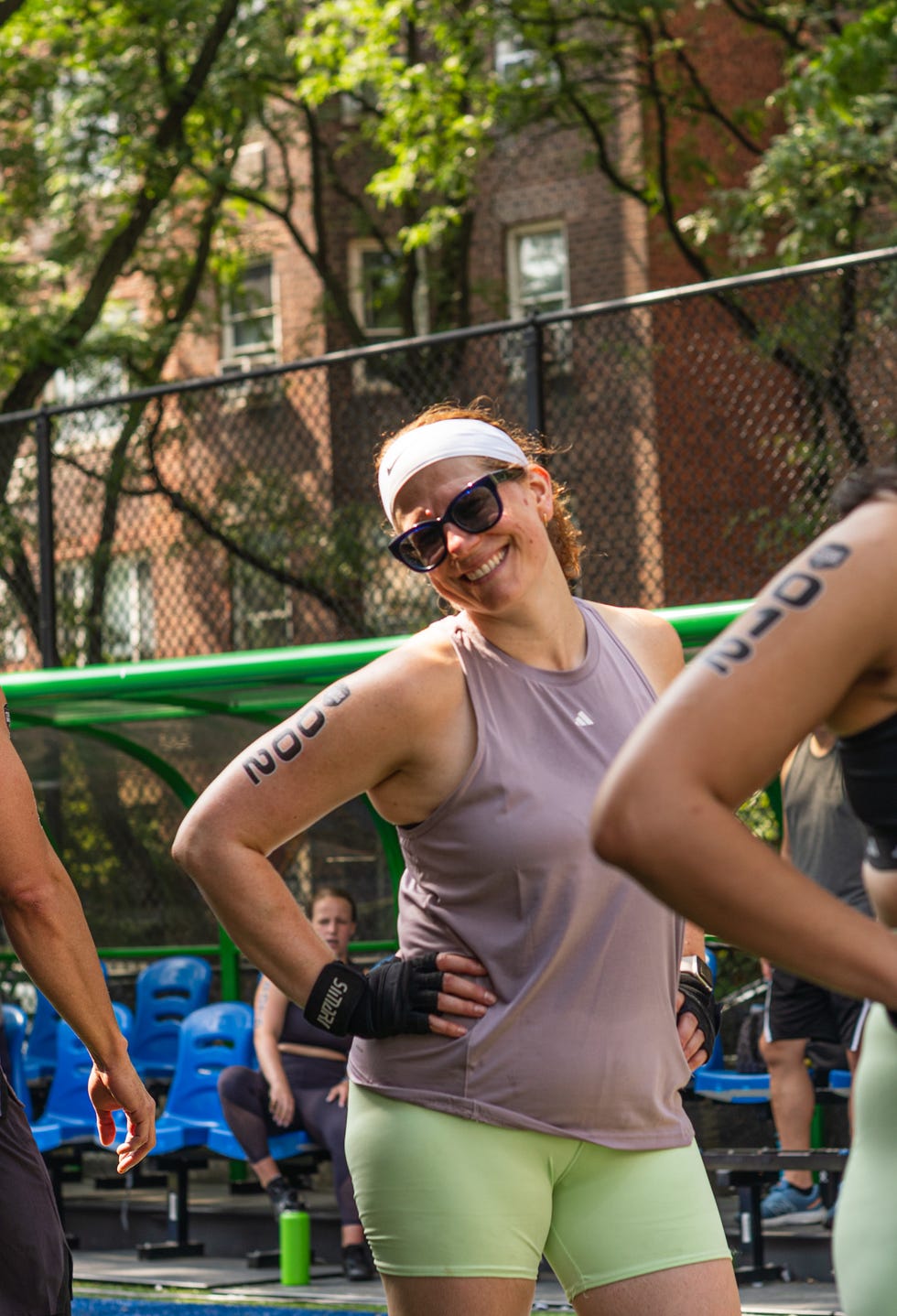 group of individuals engaged in a workout session outdoors