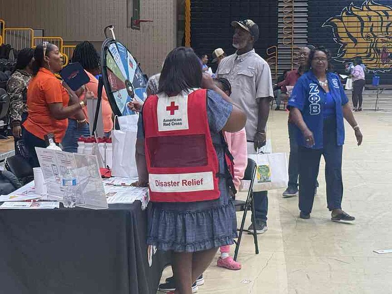 Community members engage with health resources and activities, including a disaster-relief information booth, highlighting wellness, preparedness, and community support at the Black Family Wellness Expo on Saturday, March 21, 2026. (Special to the Commercial)