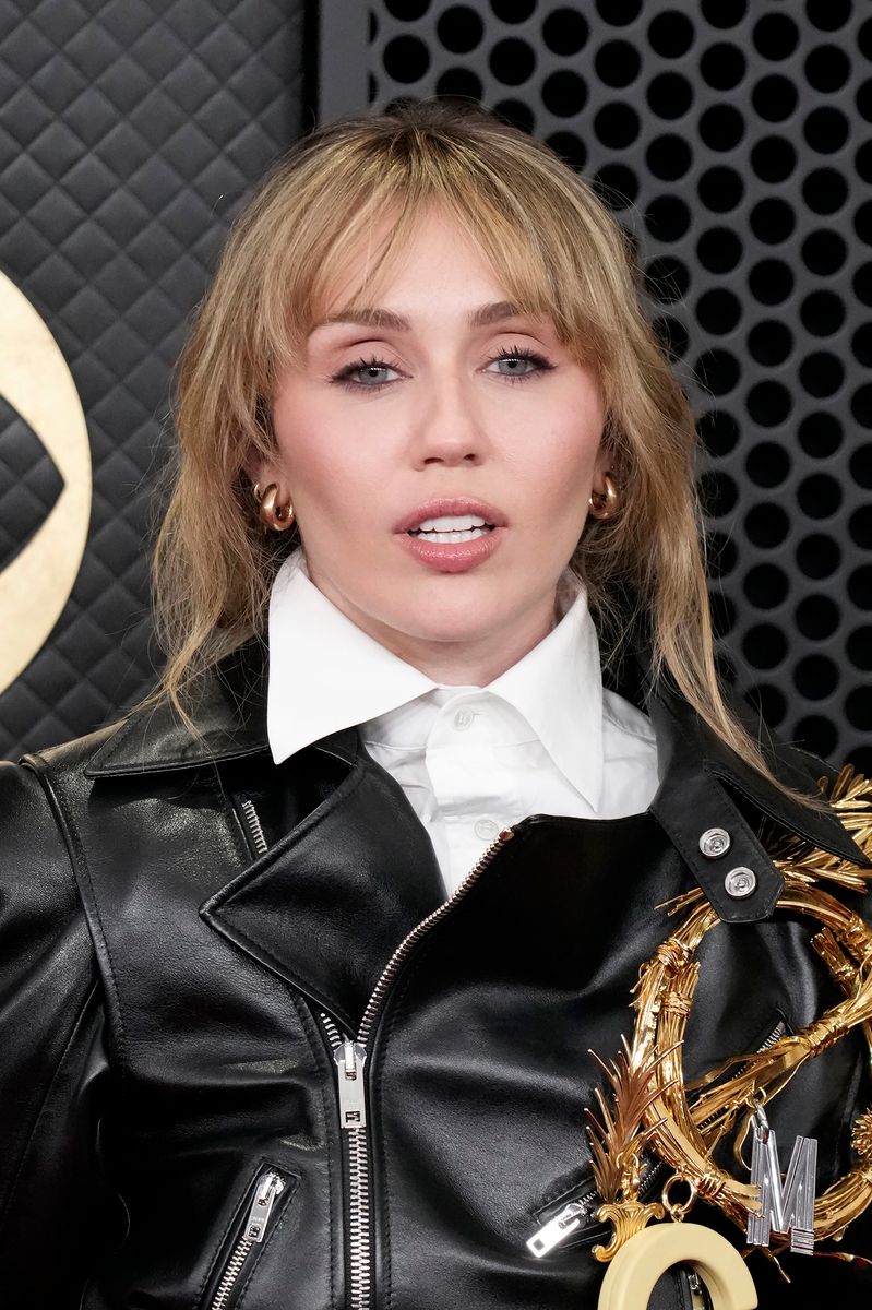 Instead of matching her hair exactly, Cyrus opts for a slightly darker brow. 