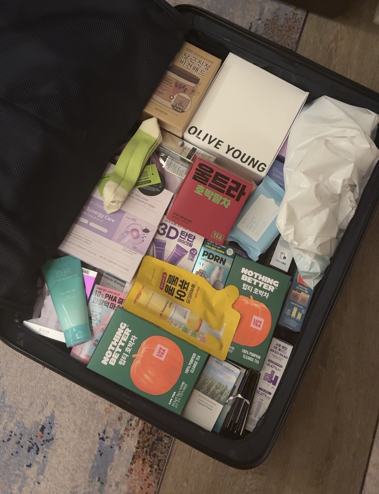 Jamie Schneider's suitcase filled with K-beauty products