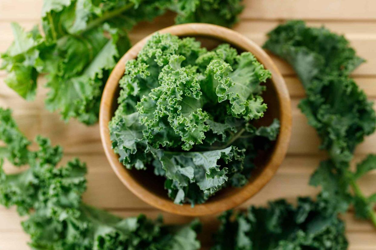 Leafy greens like kale, spinach, and mustard greens are packed with vitamin K and other essential nutrients that support overall health.Credit: janecocoa / Getty Images