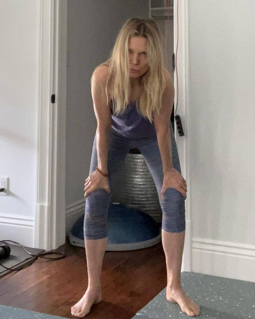 Michelle pfeiffer bending over in workout gear