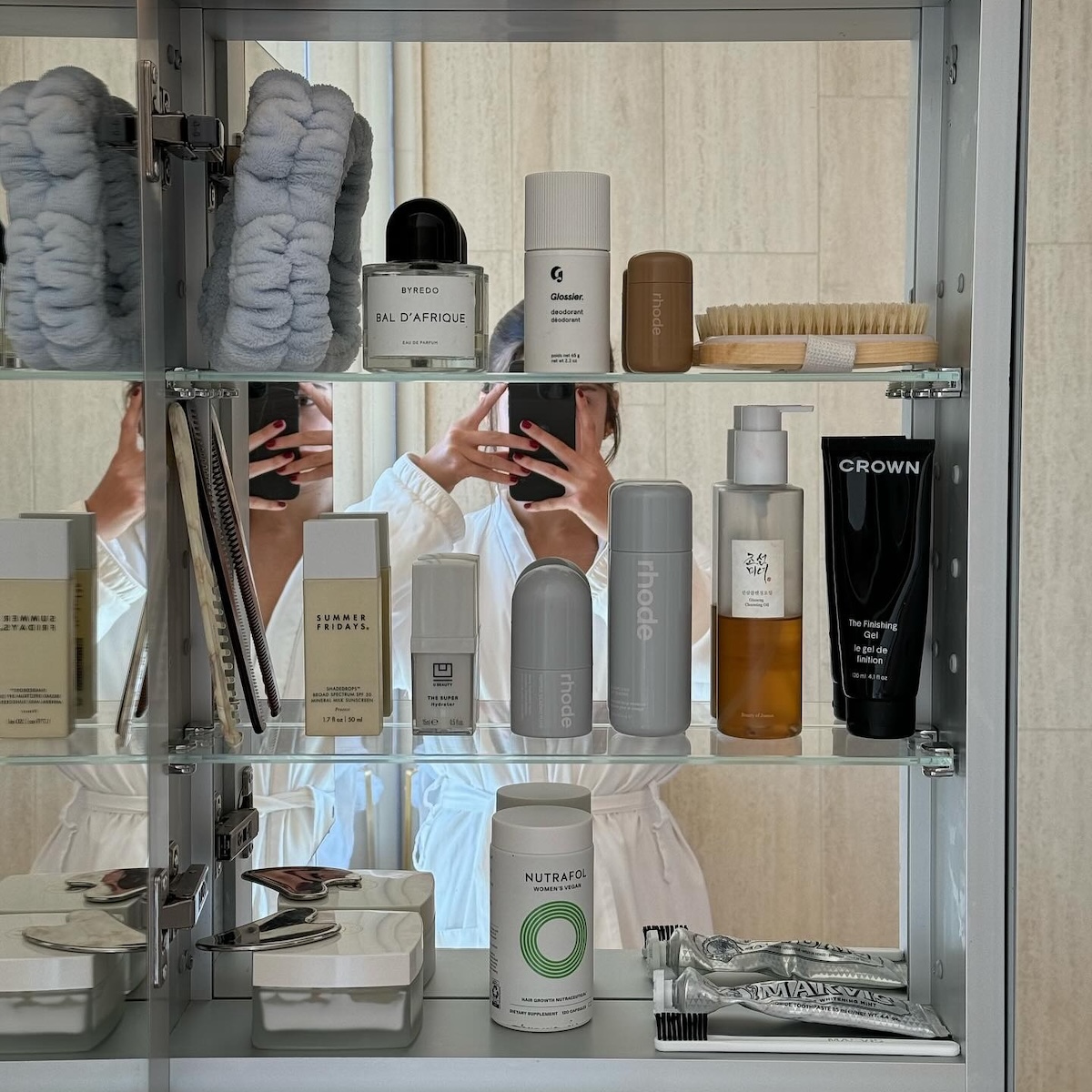 A medicine cabinet full of beauty products