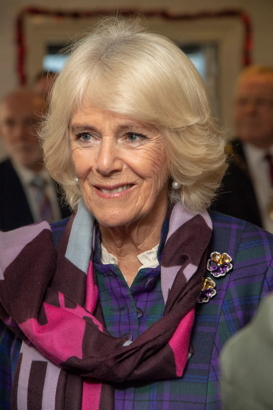 The Duchess of Cornwall, Patron, visited Emmaus Greenwich in celebration of their 25th anniversary. Her Royal Highness toured the Plumstead charity shop, meeting companions, volunteers and staff, then joined a reception in recognition of their silver anniversary. Emmaus Greenwich, Earl Rise, Plumstead, London Camilla brought and cut cake. SE18 7NF. Picture: Arthur Edwards