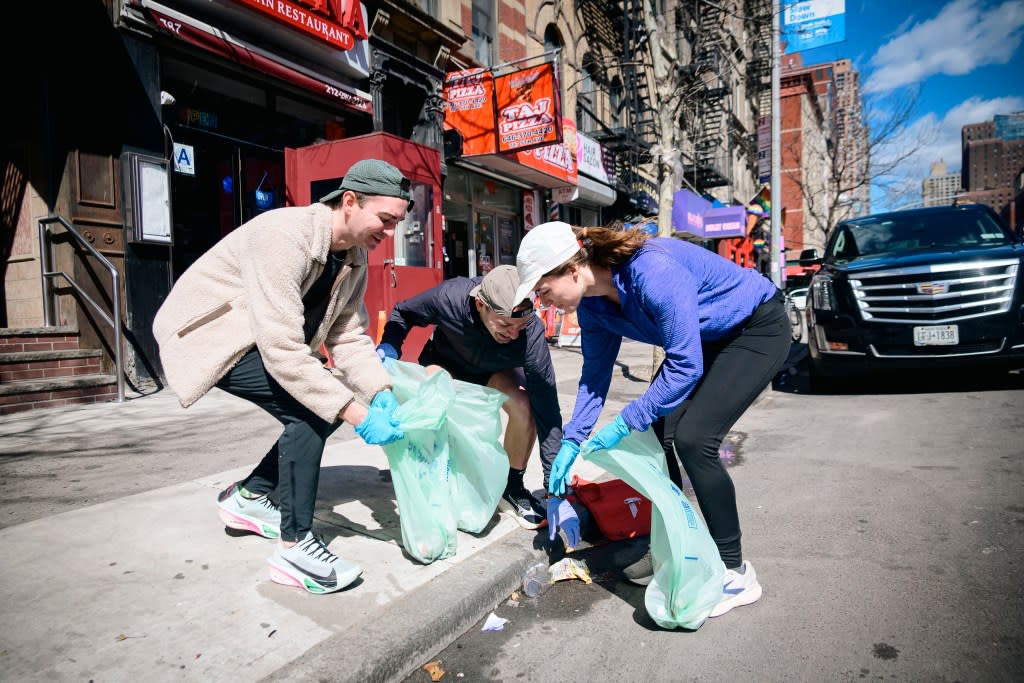 Runners not only help the environment, but they also reap the benefits of a slower-paced jog and community action. Stefano Giovannini for NYPost