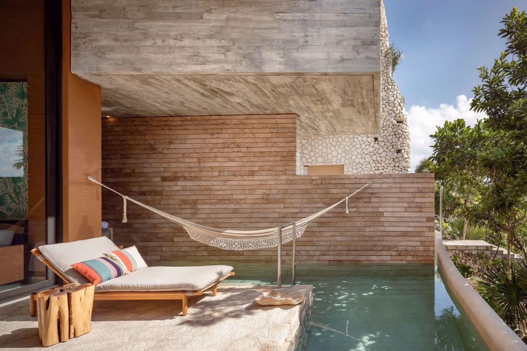 Suites also include private pools and volcanic stone bathtubs. CESAR BEJAR