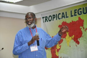 Dr. Ousmane Boukar, a cowpea breeder at IITA, giving a presentation.