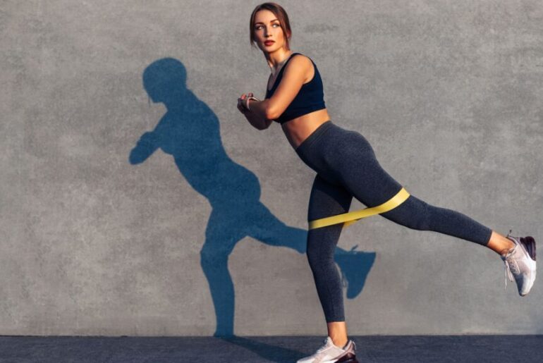 Not sit-ups or planks — this 15-minute standing resistance band workout will help you carve out a stronger core