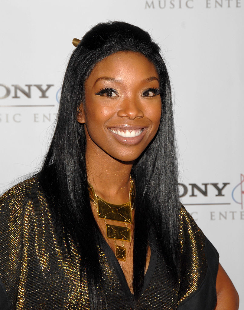 22 Of ESSENCE Cover Star Brandy’s Best Beauty Moments