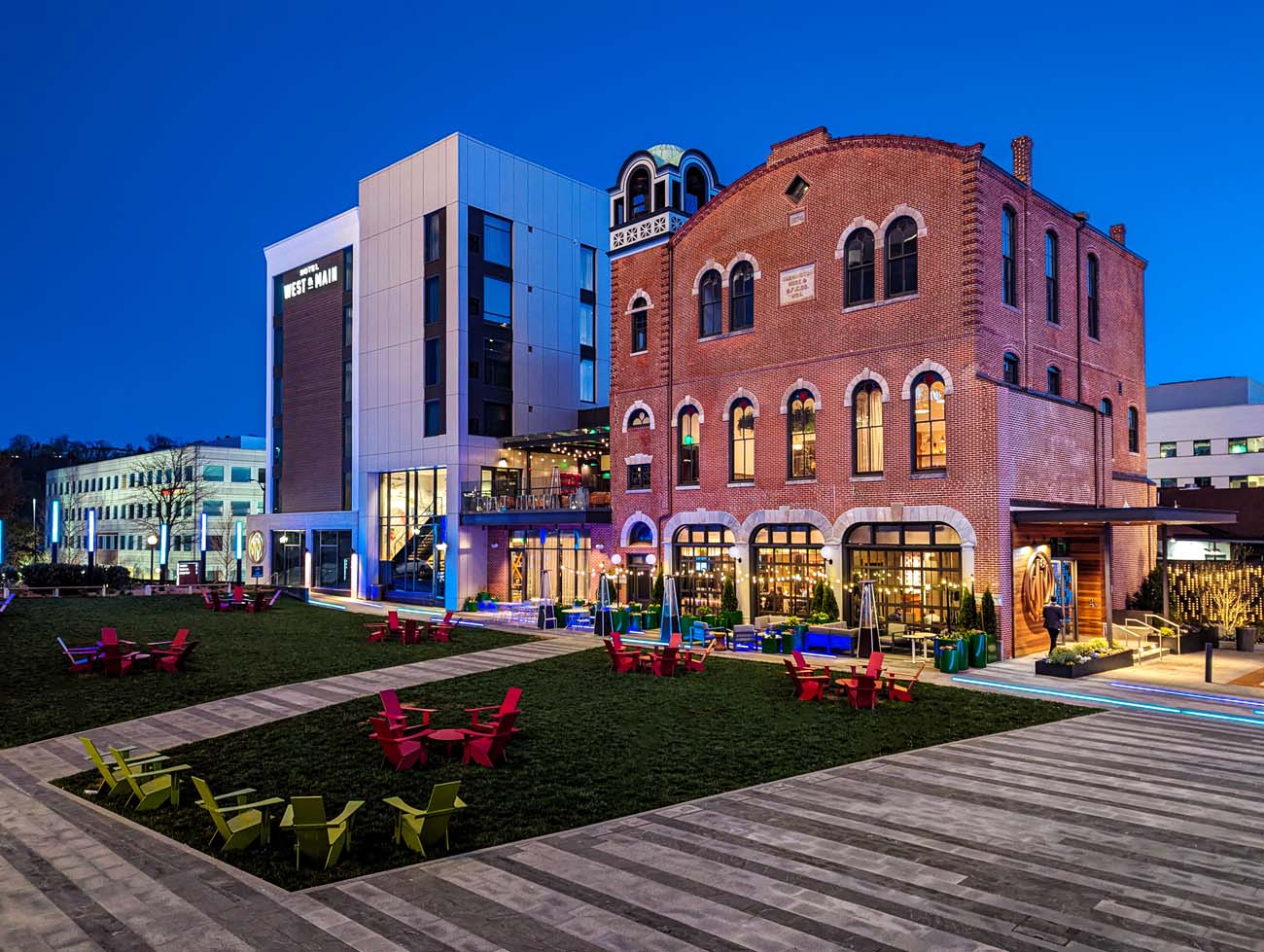 Hotel West & Main side exteriors at dusk. lit up and inviting scene by Eric Weiss from Better Living