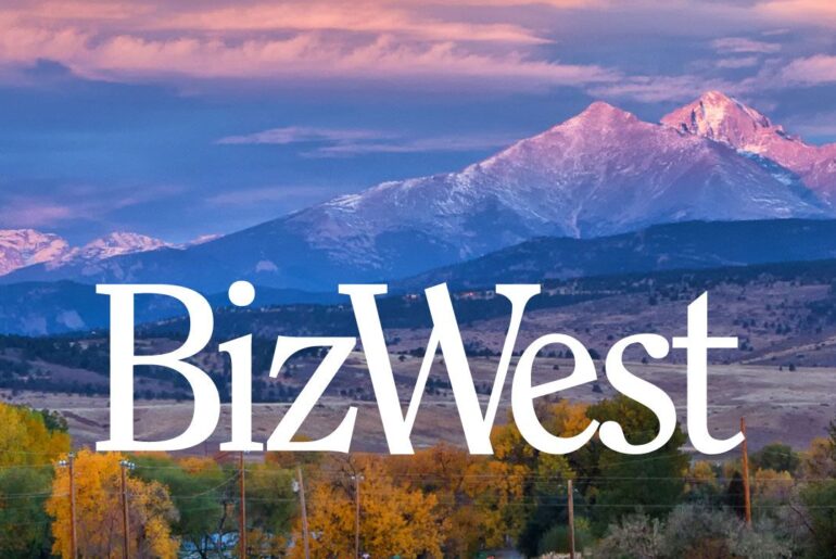 A white version of the BizWest logo, superimposed atop a beautiful photo of Longs Peak and Mount Meeker.