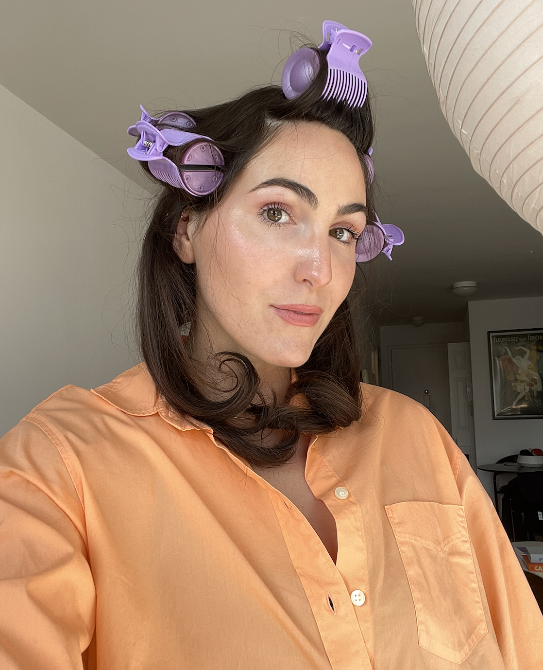 Anna LaPlaca with hot rollers in her hair.