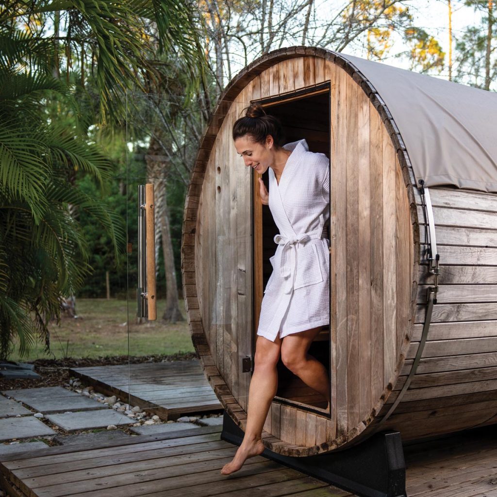 Kristi embraces the benefits of the sauna, such as deep muscle relaxation, cardiovascular support, and detoxification. Photo by Nick Shirghio