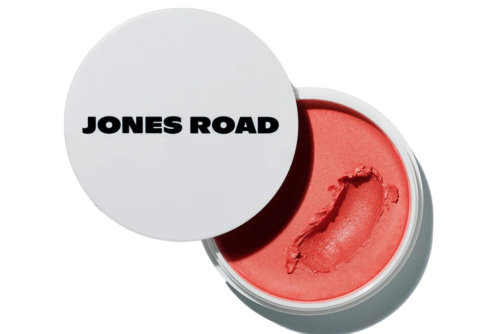 Jones Road Miracle Balm in "Miami" with a finger swipe.