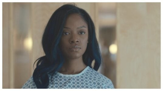 Amber Reign Smith Talks Rain's Bold Evolution in 'Beauty in Black'