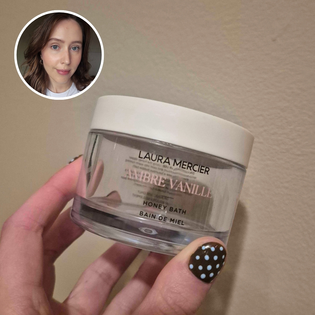 Hand holding an empty tub of Laura Mercier Honey Bath Ambre Vanille, with circular photo of Naomi Jamieson in top left corner