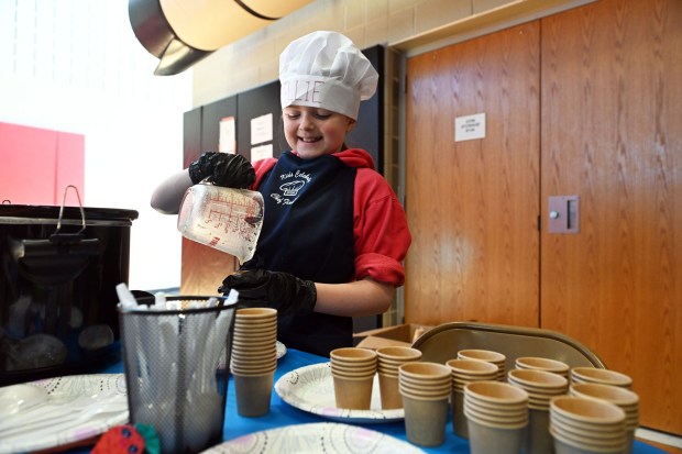 Elliana Bradley, 10, a fifth grader at Colebrookdale Elementary, pours out some of Ellie's Kitchen Easy Vegan Potato Soup during the Wellness Council of Boyertown's 19th annual Wellness Fair at the Boyertown Area Senior High School on Saturday, March 14, 2026.(BILL UHRICH/READING EAGLE)