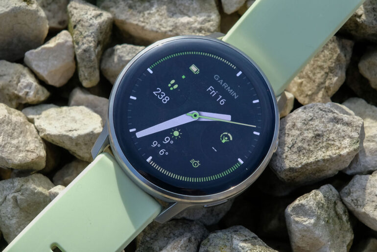 a close-up picture of the Garmin Venu 4 smartwatch laid flat on the ground