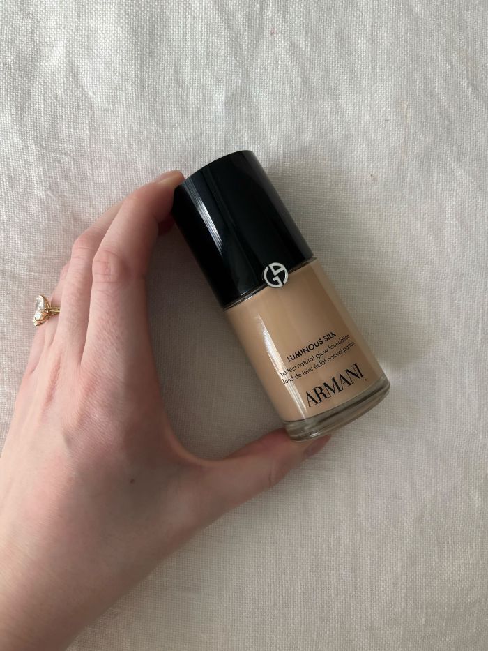 Deputy beauty editor Grace Lindsay holding the Armani Luminous Silk Foundation