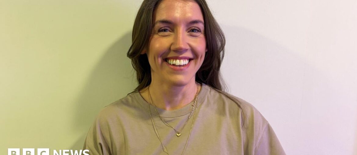 Founder of Strong Mommas Club Lauren Baines smiling at the camera.