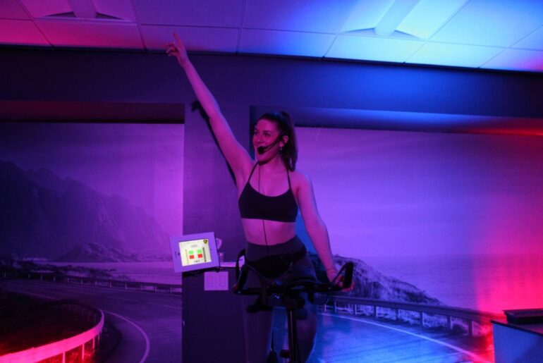 Cycling instructor Delaney Wiegel spreads joy through fitness – Old Gold & Black