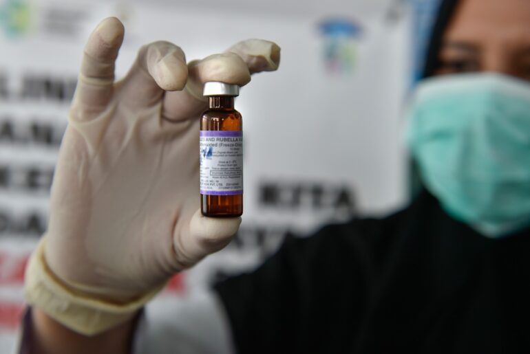 Experts refute 'natural' immunity claims as Indonesia battles measles outbreak