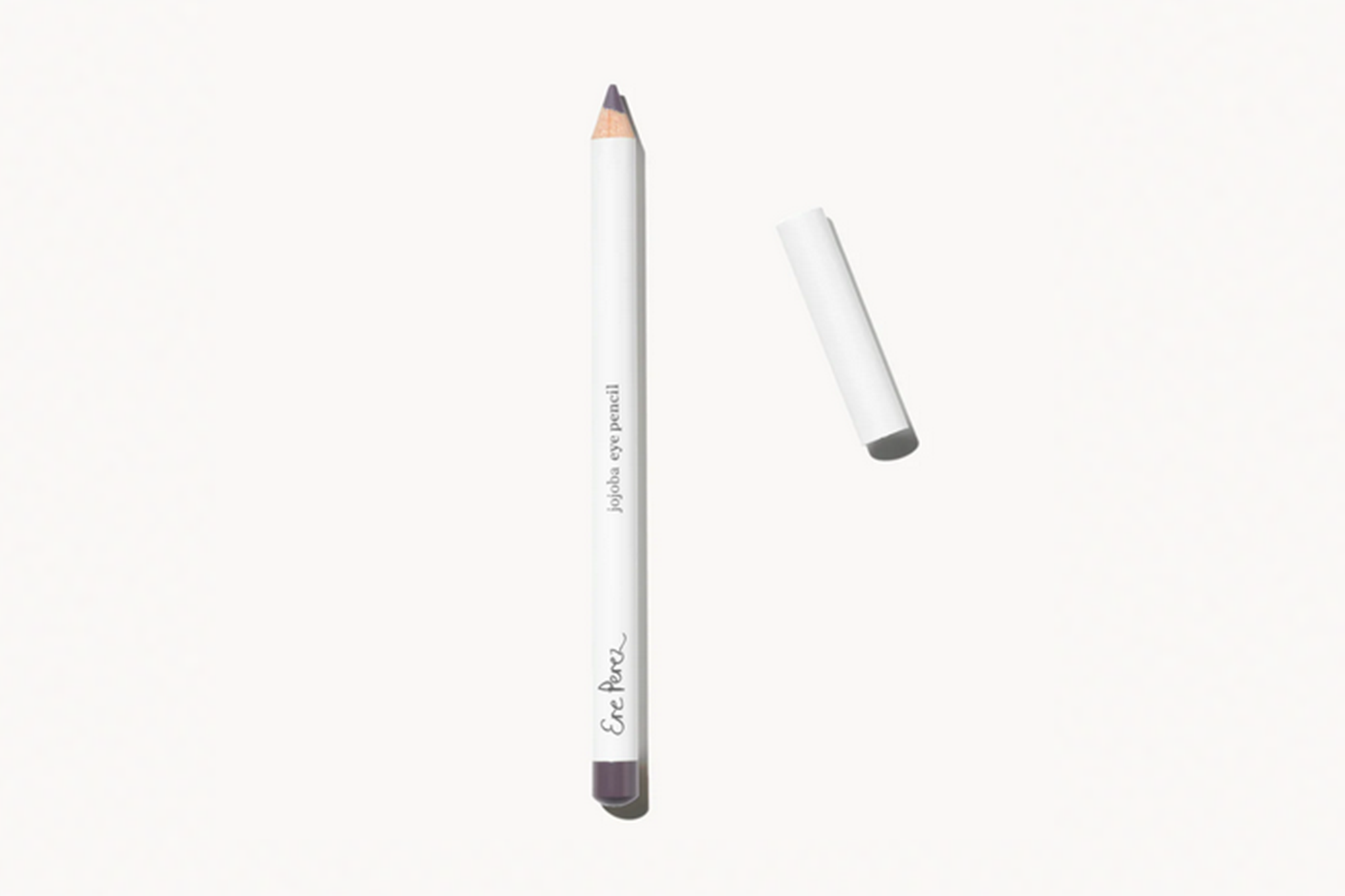 White Ere Perez Jojoba eye pencil with its cap off.