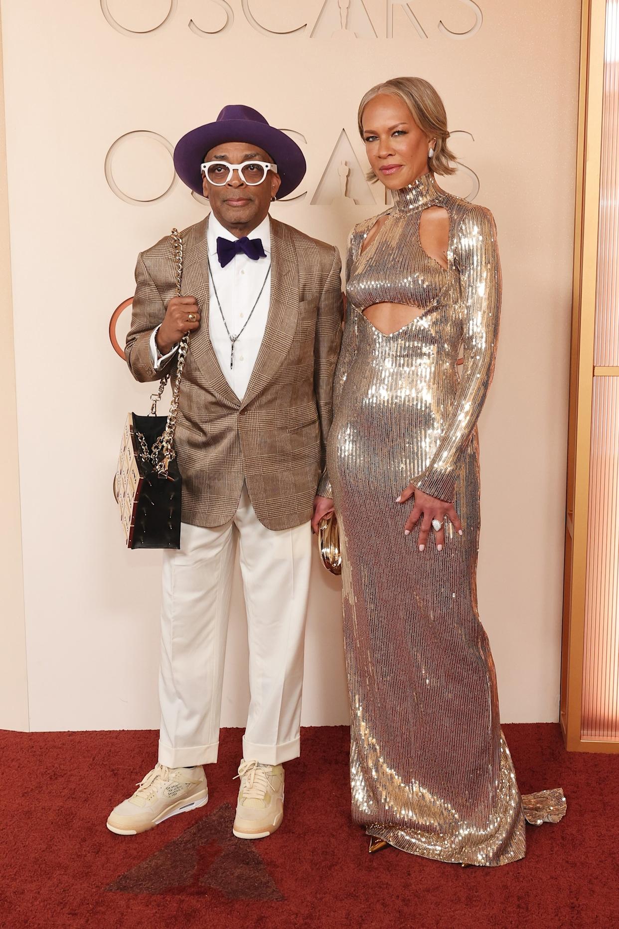Mike Coppola/Getty Images - PHOTO: Spike Lee and Tonya Lewis Lee attend the 98th Oscars, March 15, 2026 in Hollywood, Calif.