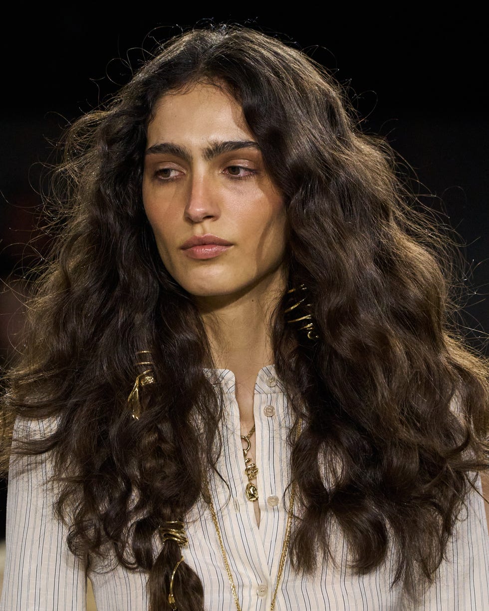 fashion model displaying hairstyle and accessories fashion model displaying hairstyle and accessories