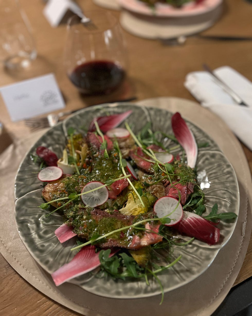 gourmet salad with meat and herbs on a decorative plate girl powder retreat review