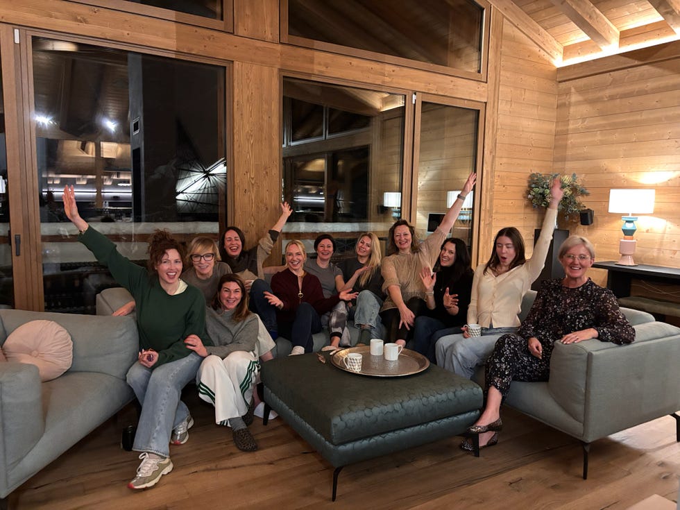 group of people celebrating indoors girl powder retreat review