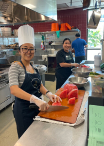 Two students working in the kitchen
