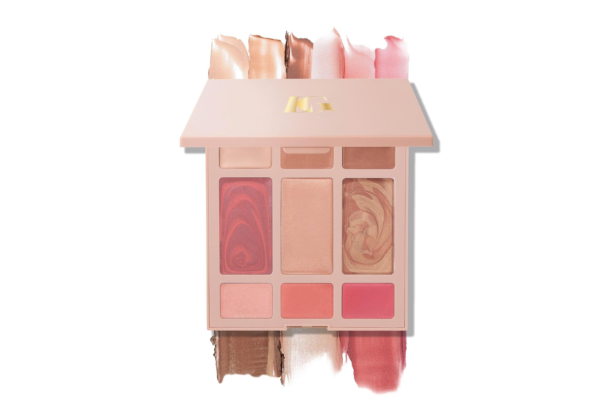 Laura Geller makeup palette with various shades of blush, highlighter, and bronzer.