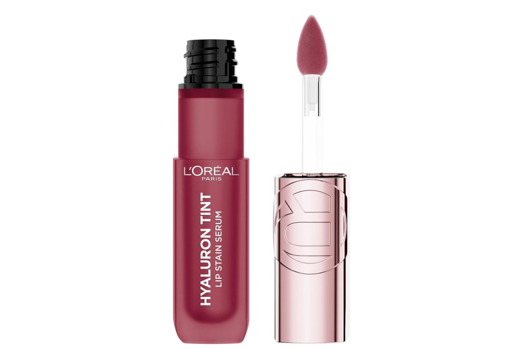 L'Oréal Paris Hyaluron Tint Lip Stain Serum in a burgundy tube with a rose gold cap and applicator.