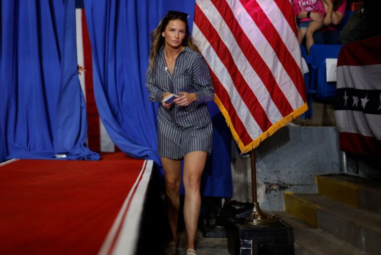 MAGA Beauty Margo Martin Wears A Plunging Dress To Ease Tensions