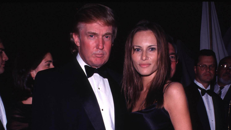 Melania Knauss and Donald Trump at a gala in 1998
