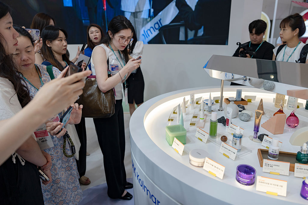 Visitors explore K-beauty products during Seoul Beauty Week 2025 at Dongdaemun Design Plaza in Seoul. (Getty Images)