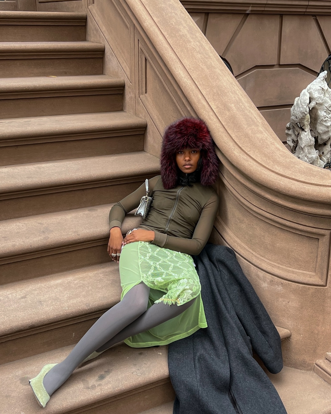 Destiny Joseph with natural-looking makeup and an elevated, sporty outfit