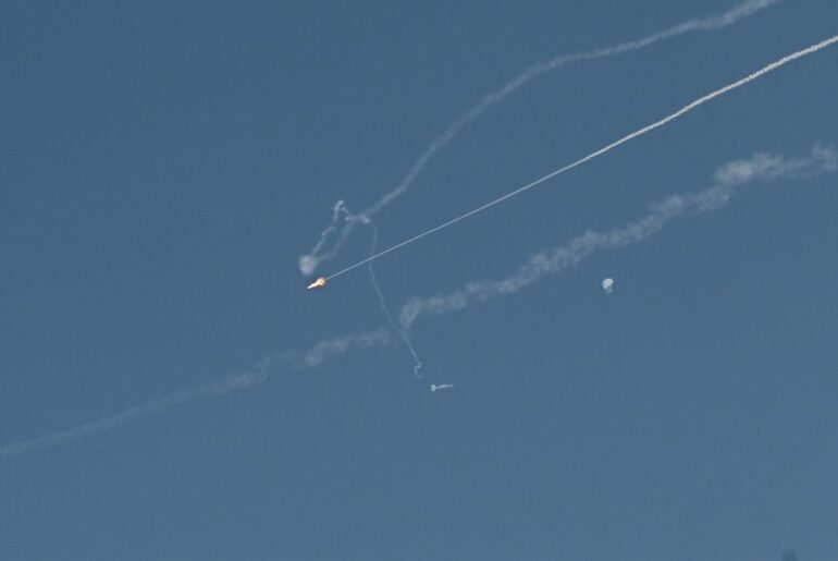 Explosions from the interception of an Iranian projectile are seen in the sky over Dubai on March 1, 2026. (AFP Photo)