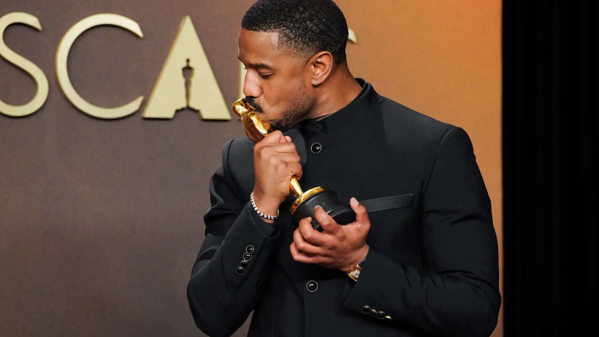 Michael B. Jordan, winner of the award for actor in a leading role for "Sinners," poses in the press room at the Oscars on Sunday, March 15, 2026, at the Dolby Theatre in Los Angeles. (Photo by Jordan Strauss/Invision/AP) 'One Battle After Another' triumphs at 98th Academy Awards in coronation for Paul Thomas Anderson